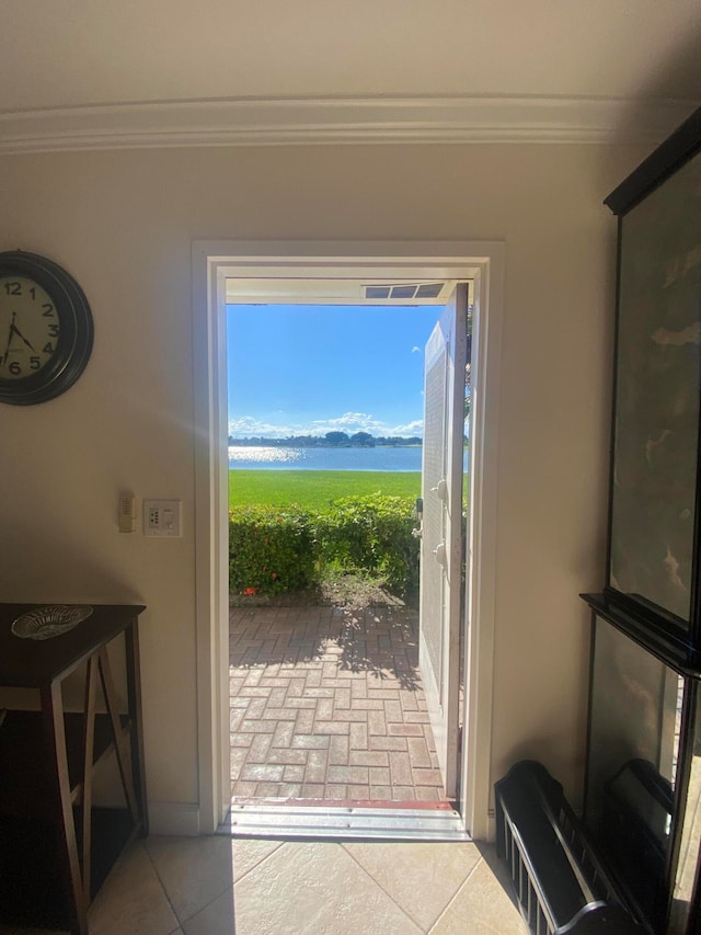 entryway featuring crown molding and a mountain view