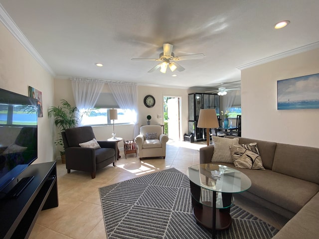 tiled living room featuring ornamental molding and ceiling fan