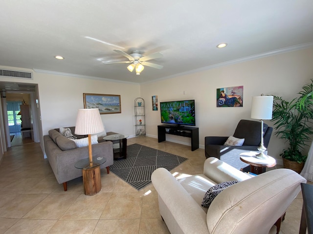 living room with light tile patterned floors, ornamental molding, and ceiling fan