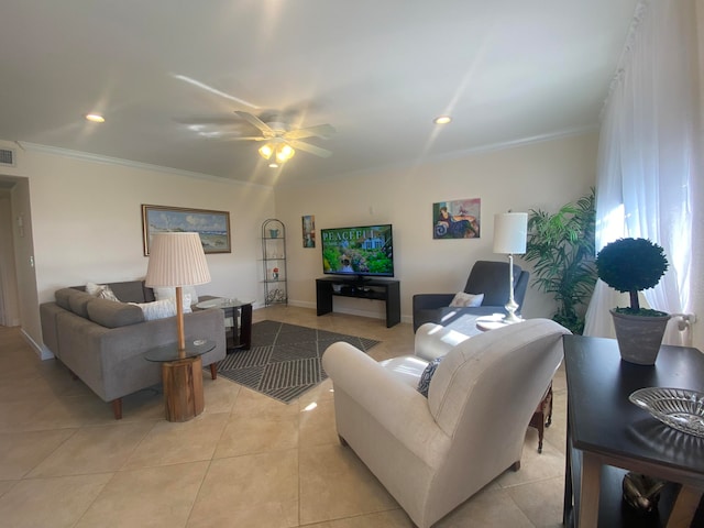 living room featuring ceiling fan, light tile patterned floors, and ornamental molding