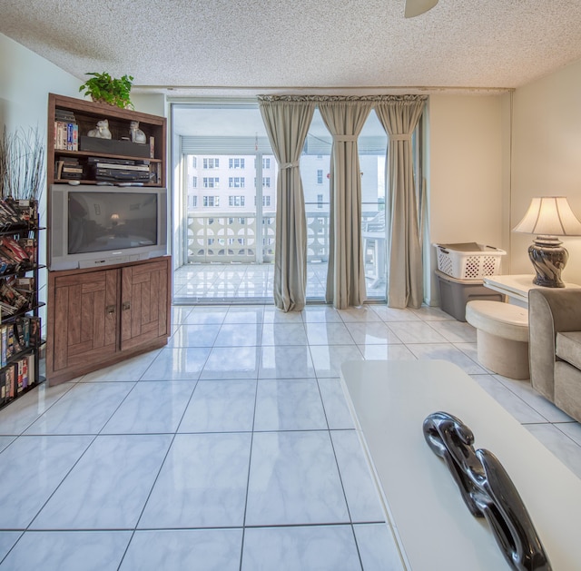 tiled living room with a textured ceiling