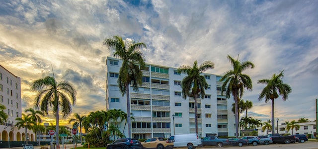 view of outdoor building at dusk