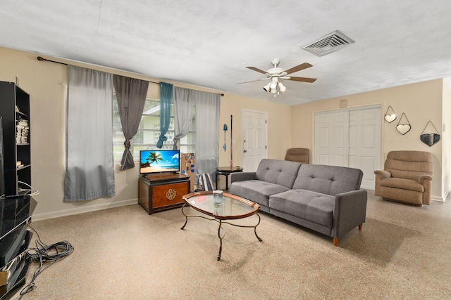 living room with ceiling fan