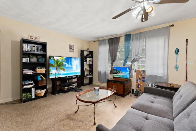 living room with ceiling fan and light carpet