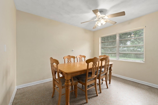 dining space with ceiling fan