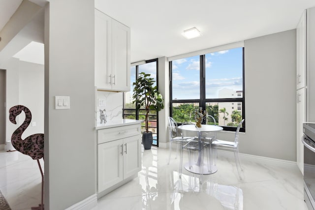 interior space featuring white cabinetry