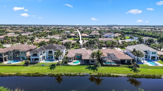 drone / aerial view featuring a water view