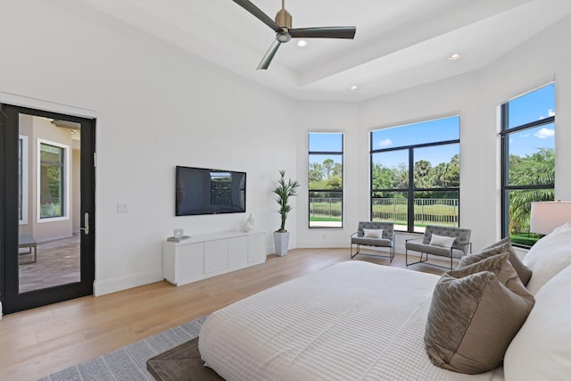 bedroom featuring light hardwood / wood-style flooring and ceiling fan