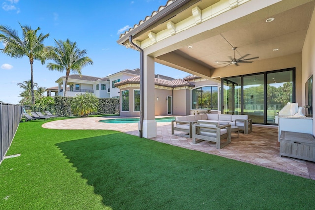 exterior space with ceiling fan, a fenced in pool, an outdoor hangout area, and a patio