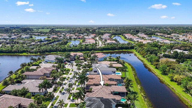 birds eye view of property featuring a water view