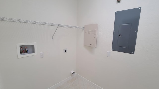 washroom featuring electric dryer hookup, electric panel, baseboards, hookup for a washing machine, and laundry area
