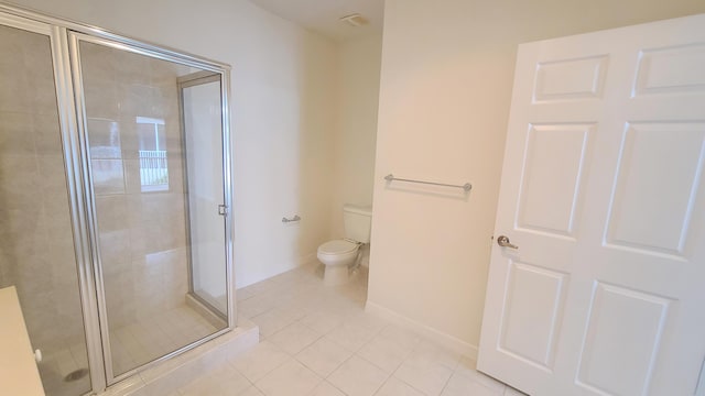 full bath with baseboards, a stall shower, toilet, and tile patterned flooring