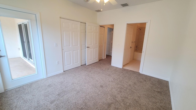 unfurnished bedroom featuring connected bathroom, visible vents, baseboards, a closet, and carpet