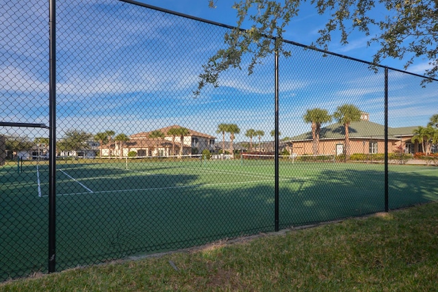 1840 S Dovetail Dr, Fort Pierce, FL 34982 - view of tennis court featuring fence