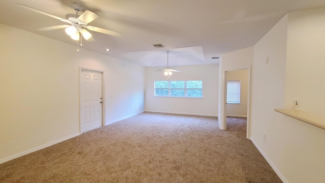 unfurnished living room featuring visible vents, ceiling fan, carpet flooring, and baseboards