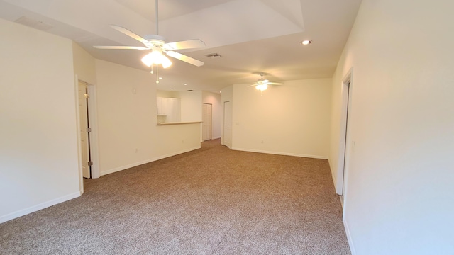 spare room with recessed lighting, ceiling fan, and light colored carpet