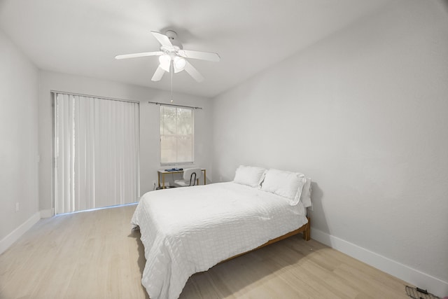 bedroom featuring ceiling fan and light hardwood / wood-style flooring