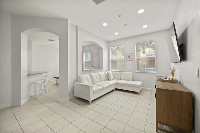 living room featuring light tile patterned floors