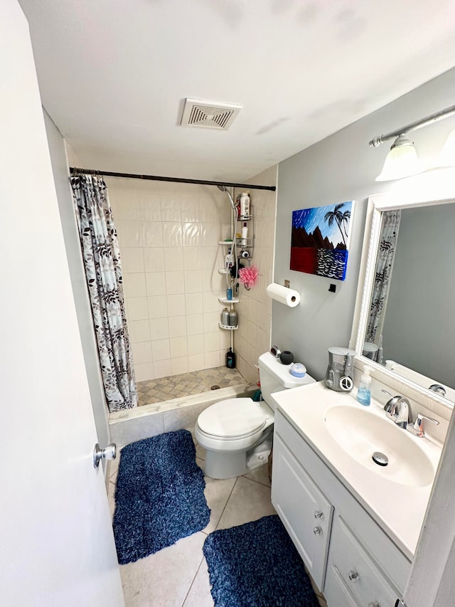 bathroom featuring walk in shower, tile patterned flooring, vanity, and toilet