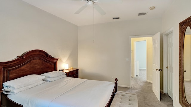 bedroom featuring ceiling fan and light colored carpet