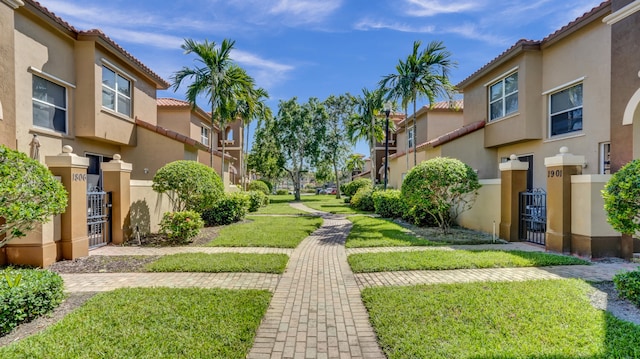 surrounding community featuring a yard