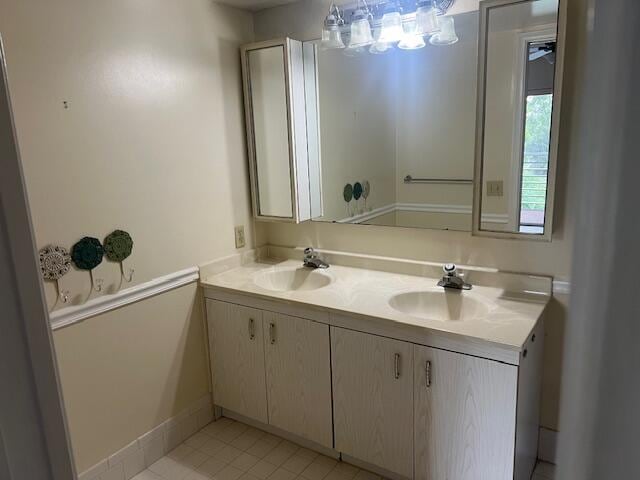 bathroom featuring vanity and tile patterned flooring