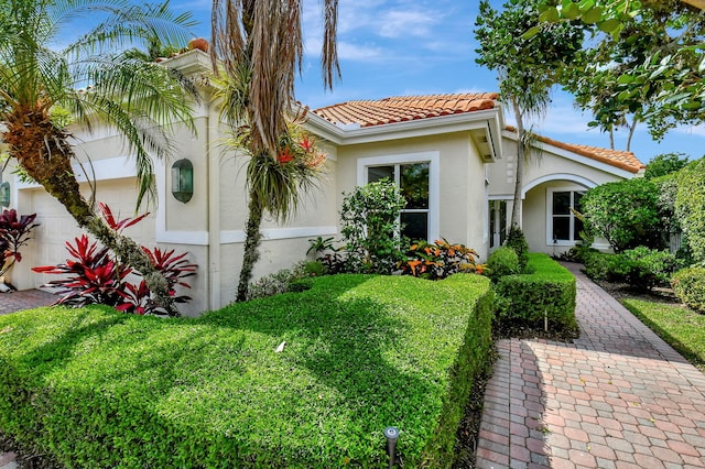 view of front of property with a garage