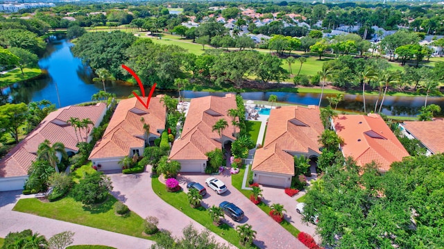 birds eye view of property featuring a water view