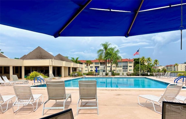 view of swimming pool featuring a patio