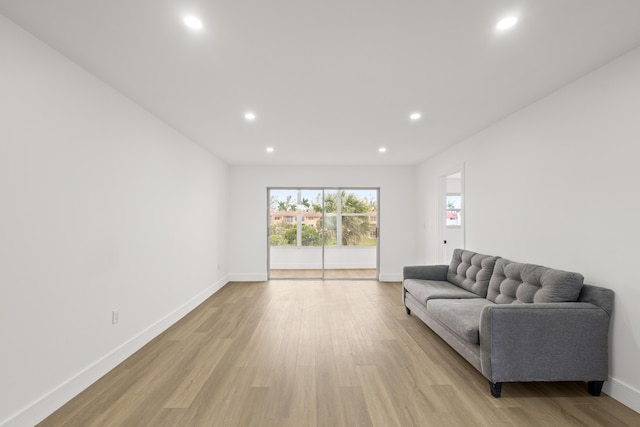 living room with light hardwood / wood-style floors