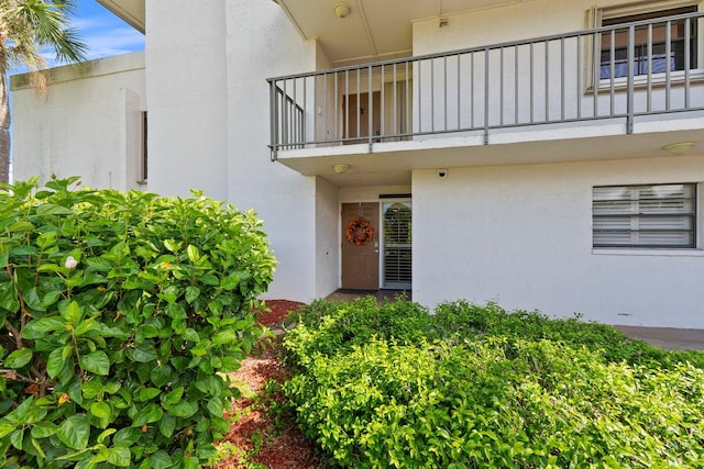 property entrance with a balcony