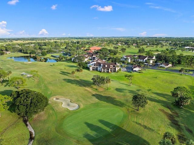 3500 Twin Lakes Ter Unit 106, Fort Pierce, FL 34951 - drone / aerial view with view of golf course, a water view, and a residential view