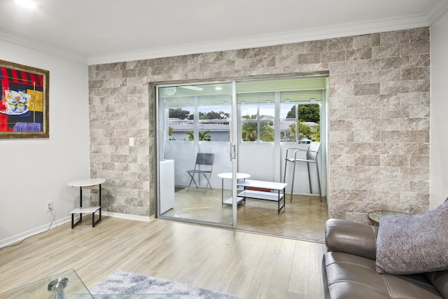 living room featuring wood-type flooring and ornamental molding