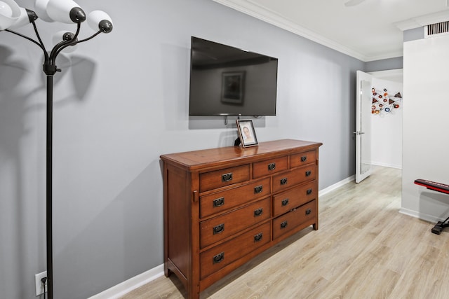 interior details with crown molding and wood-type flooring