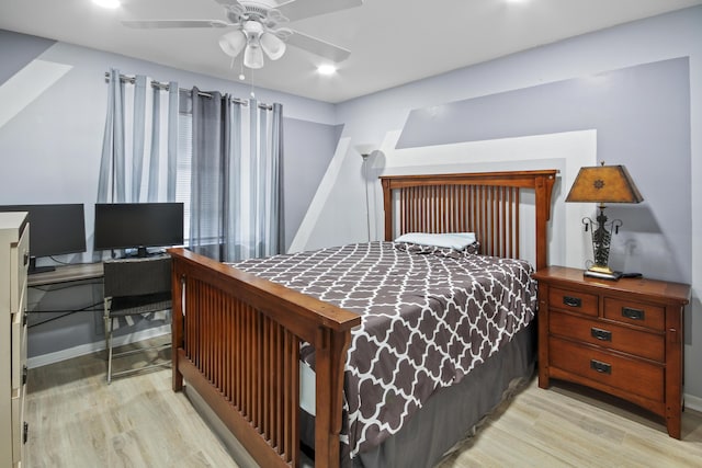 bedroom with ceiling fan and light wood-type flooring