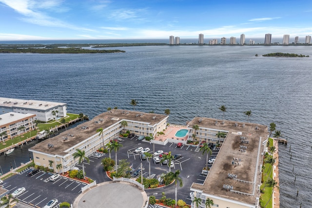 birds eye view of property featuring a water view