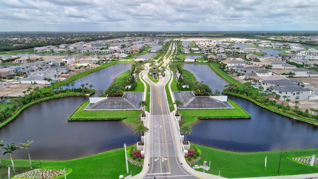 bird's eye view with a water view