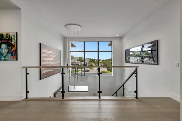 stairway featuring hardwood / wood-style flooring