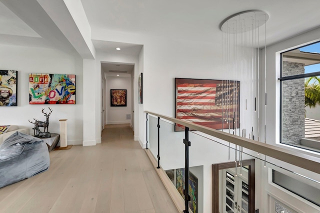 corridor featuring light hardwood / wood-style flooring