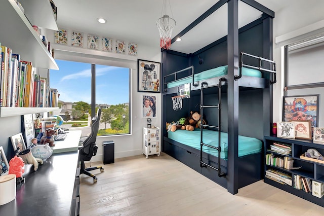 bedroom with wood-type flooring