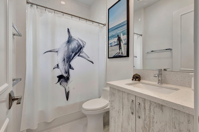 full bathroom with tile patterned flooring, vanity, shower / bath combination with curtain, and toilet