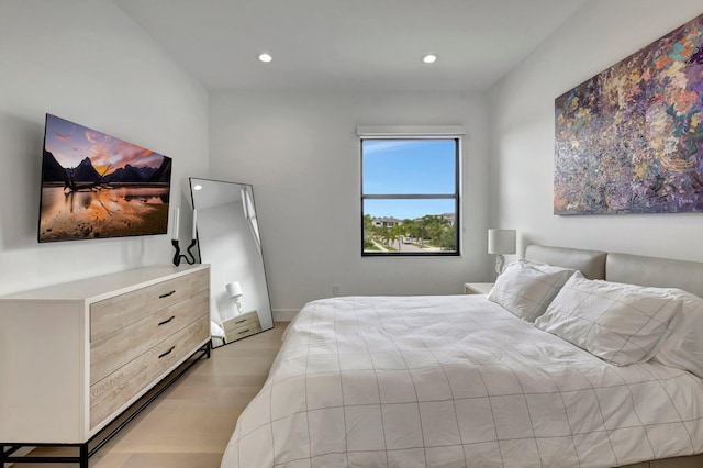 bedroom with light hardwood / wood-style flooring