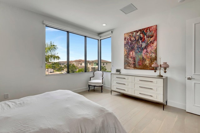 bedroom featuring light wood-type flooring