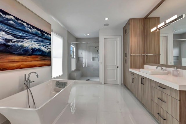 bathroom with tile patterned flooring, shower with separate bathtub, and vanity