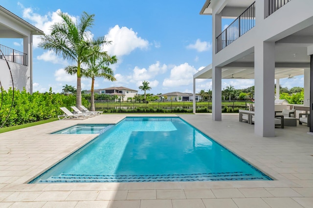 view of pool featuring a patio