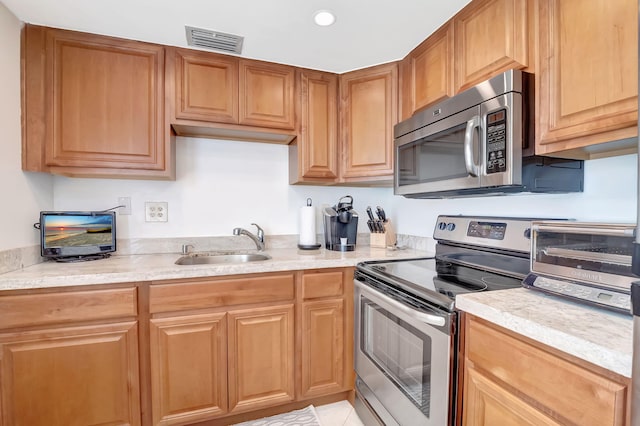 kitchen with stainless steel appliances and sink