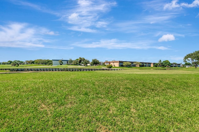 view of yard with a rural view