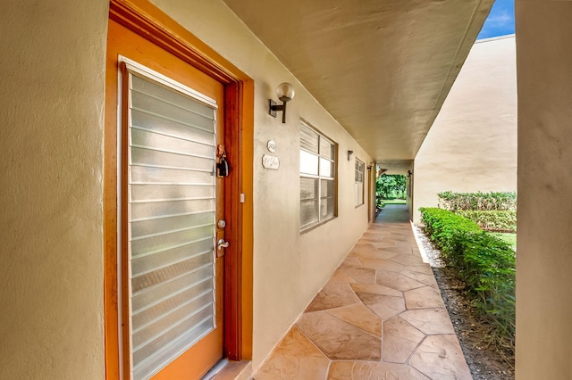 436 Flanders J, Delray Beach, FL 33484 - entrance to property featuring stucco siding