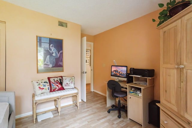 office area featuring light hardwood / wood-style floors