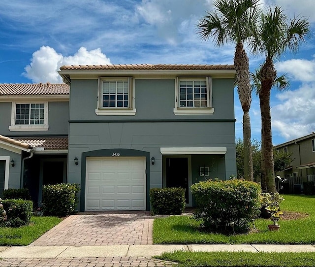 view of front of house with a garage